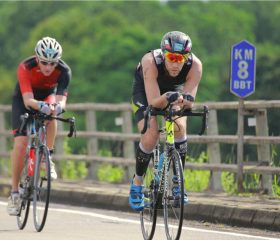 Competitive-man-on-bike-course